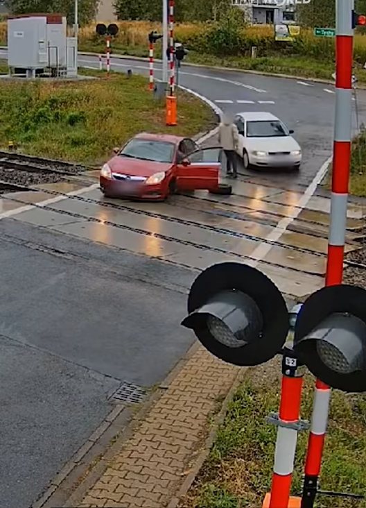 A car lost its wheel while crossing train tracks