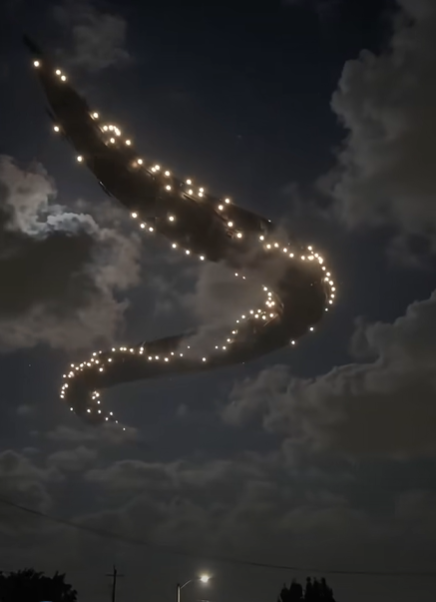 MYSTERIOUS GLOWING DRAGON LIGHTS UP SKIES